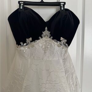 Ellie Wilde Mon Cherri Black and White Strapless gown with pockets 
Used once